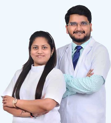 Two smiling doctors from our care team